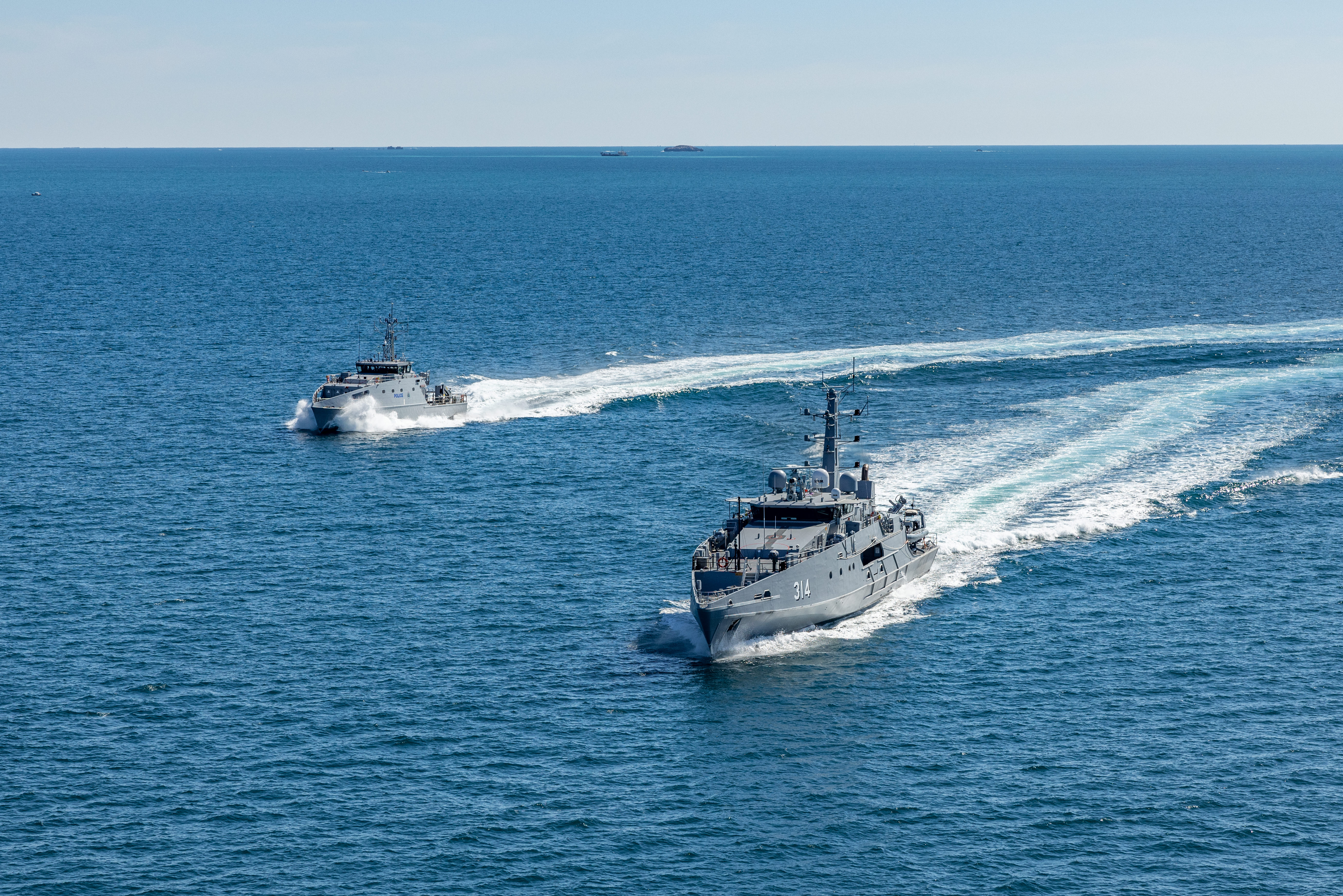 Image of an Evolved Cape-class and Guardian-class patrol boats designed and constructed by Austal during sea trials.