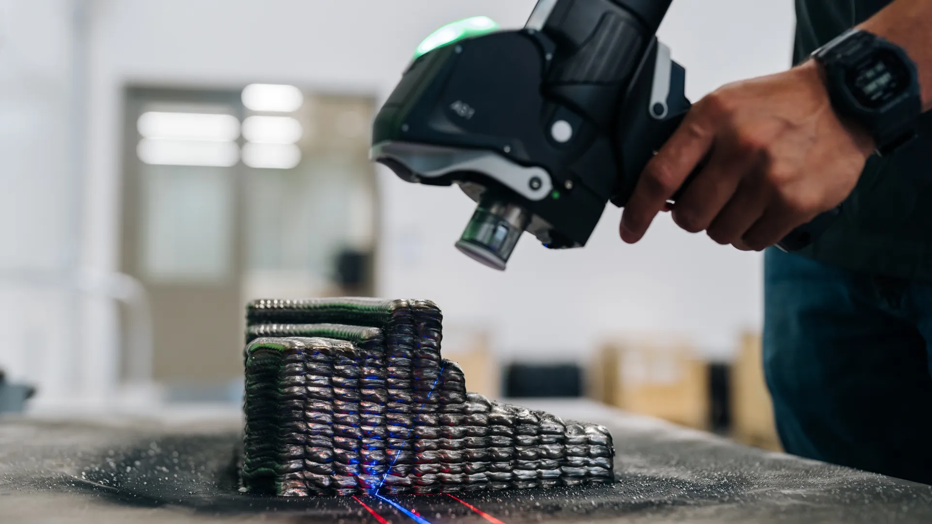 A metal additive manufacturing product being created.
