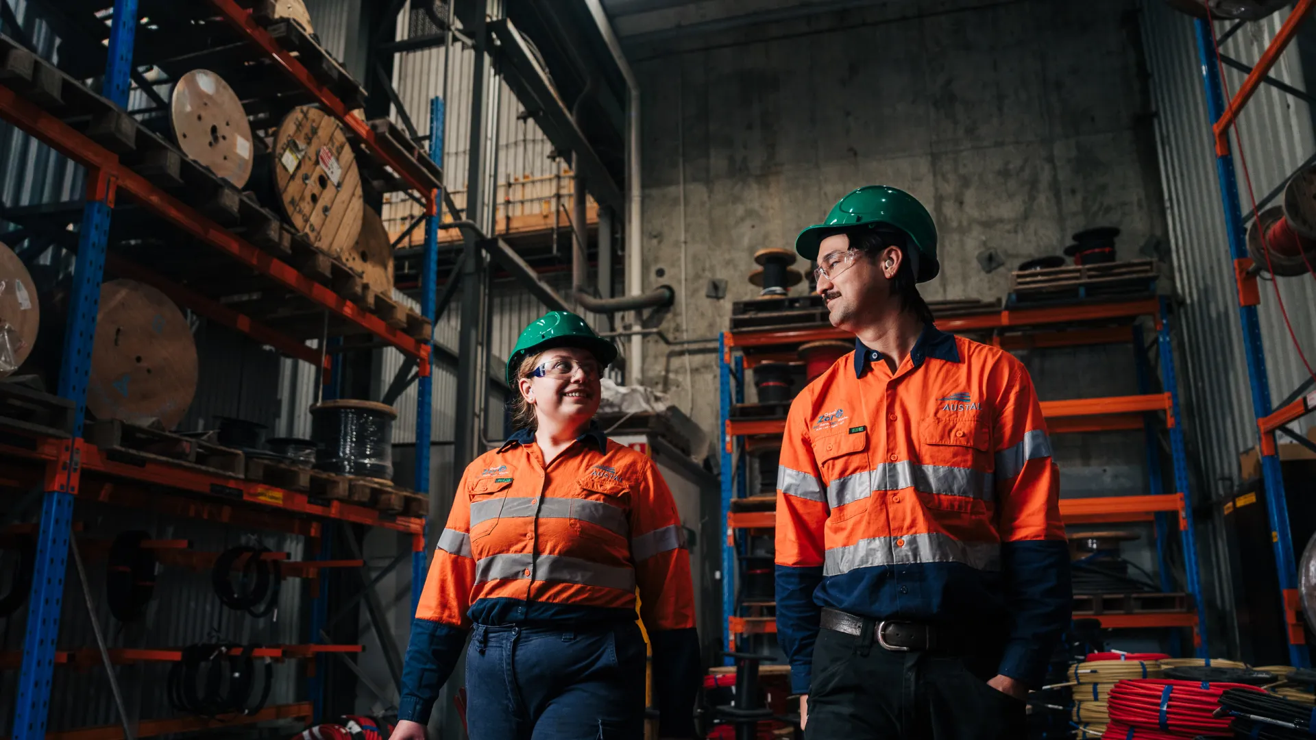 Image of Austal employees walking in production bay.