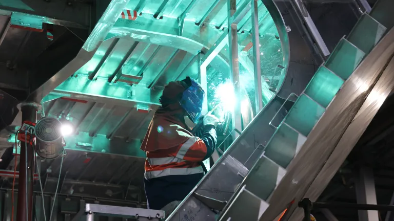 Image of Austal Australia employee working in a production environment.