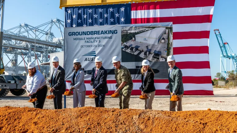 Image of people at the October 2024 groundbreaking ceremony for Austal USA's new Submarine Module Manufacturing Facility.